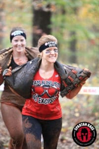 action shot of crystal pace competing in the Spartan Race