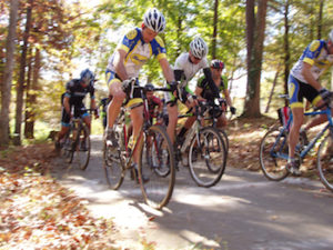 cyclists riding on an outdoor trail