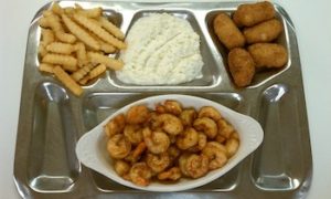 shrimp, hushpuppies, and fries from the flounder fishcamp