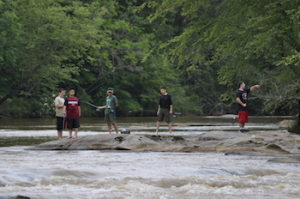 group of people fishing at the Tyger River Foundation’s first annual Fish the Tyger event