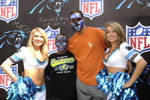 cheerleaders with fans at carolina panthers training camp